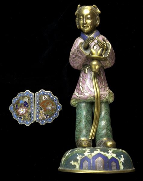 2 Pcs. Chinese cloisonne.: 2 Pcs. Chinese cloisonne. (1) two-part belt buckle, 3"W; (1) youthful figure holding a flower basket on a dome shaped base, 8.5"H. Provenance: From the collection of a prominent Northern California co