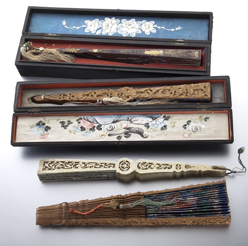 (4) Chinese Qing export fans,: (4) Chinese Qing export fans, worked in exquisite details from sandal wood, mother-of-pearl and oxbone, two with original lacquer and embroidery lining boxes. Largest 11"H. Provenance: From the collec