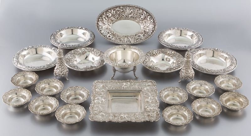 (23) Kirk sterling Repousse items: (23) Kirk sterling Repousse items comprising (12) individual salt cellars; (1) oval serving dish; (6) small serving dishes of various size; (1) small square serving dish; (1) footed sauce bowl; (1) pr
