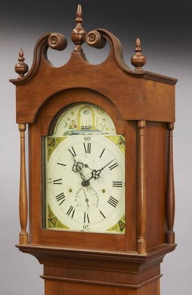 American wooden works cherry tall case clock: American wooden works cherry tall case clock the painted dial marked "L. Watson, Cincinnati" with masonic symbols in the arch. Luman Watson (1790-1834) 97.5" H x 17.5" W x 10.25" D, Circa - 1820-1830.