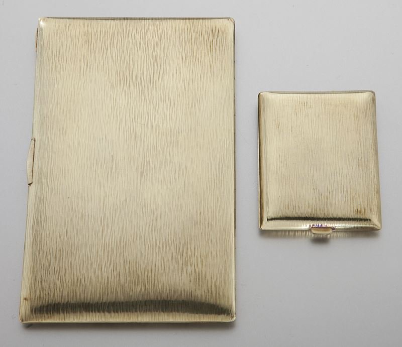 Tiffany 14K gold cigarette case and match safe: Tiffany 14K gold cigarette case and match safe set in original black leather case, each styled with a naturalistic faux-bois finish and hinging open with tab clasp, monogrammed AEC to the center and m