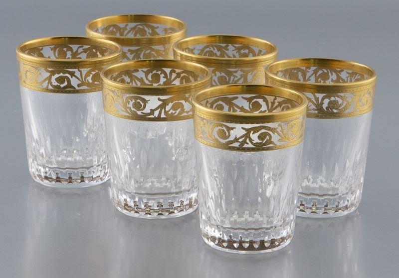 (6) St. Louis "Thistle" pattern shot glasses,: (6) St. Louis "Thistle" pattern shot glasses, the lip and foot with gilt bands, the body and stem with cut and etched decoration. Acid etched stamp, "Cristal St. Louis France". 2.25" H, Circa 20th C.