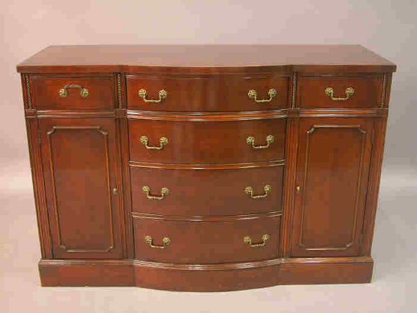 A Duncan Phyfe style mahogany buffet.: A Duncan Phyfe style mahogany buffet. 3'1"H x 4'6"W x 1'9"D, Circa - Mid 20th C.