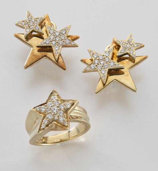 Jose Hess 18K gold and diamond earrings and ring: Jose Hess 18K gold and diamond earrings and ring set featuring a burst of stars mounted with diamonds with clip and post backs, stamped, "Jose Hess 18K 2028481A," with a matching ring, stamped, "Jose