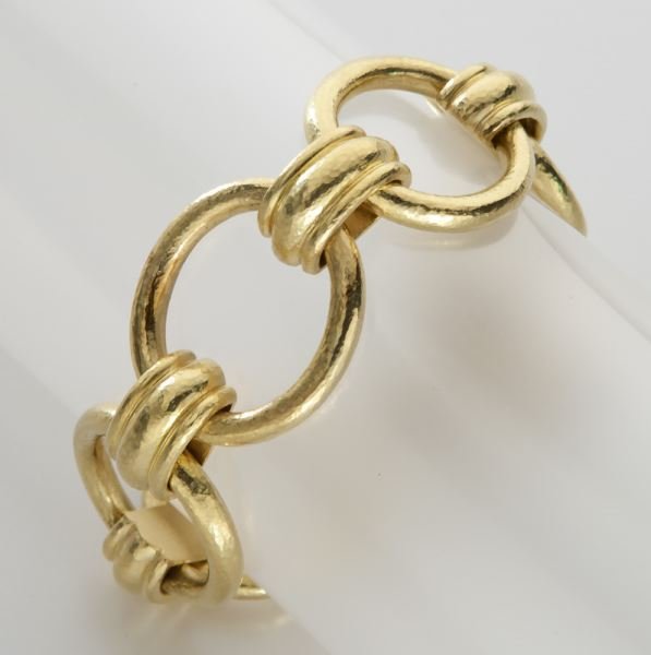 Elizabeth Locke 19K gold and ruby bracelet.: Elizabeth Locke 19K gold and ruby bracelet. Stamped, "19K" with maker's mark. 87.6 grams. 7.5" L, Circa - Contemporary.