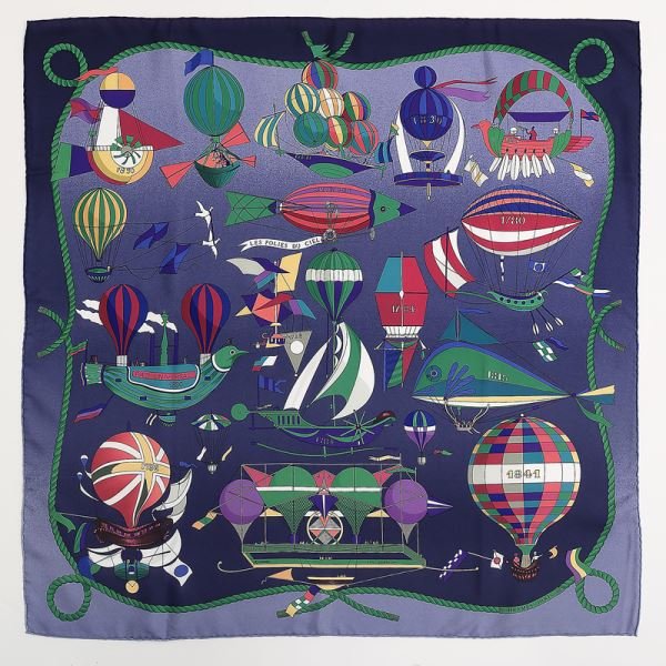 Hermes "Les Folies du Ciel" silk scarf: Hermes "Les Folies du Ciel" silk scarf on a purple ground. Designed by Loïc Dubigeon in 1984.