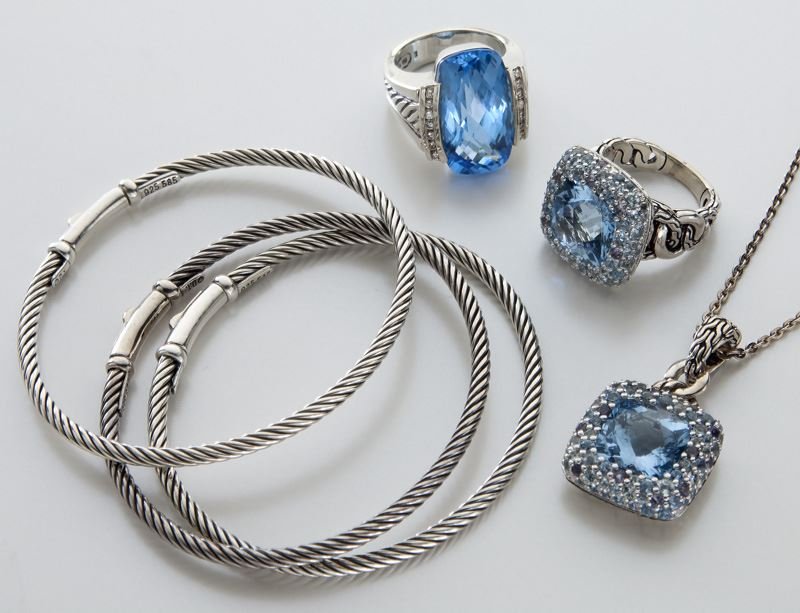 6 pcs. John Hardy / David Yurman sterling jewelry: 6 pcs. John Hardy / David Yurman sterling jewelry including (1) Hardy topaz pendant on chain,17.5" L, (1) Yurman diamond and topaz ring size 7, (1) Hardy topaz ring, size 6, and (3) Yurman bracelets.
