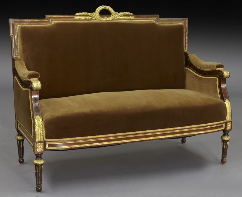 19th C. French Louis XVI style parcel gilt settee: 19th C. French Louis XVI style parcel gilt settee the back centered by a carved, gilt laurel wreath, the arms with carved, gilt acanthus decoration, on fluted, circular, tapered legs, with brown uphol