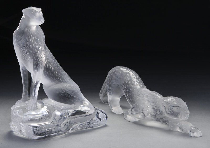 (2) Lalique France crystal panthers,: (2) Lalique France crystal panthers, one sitting, one crouching; each signed "Lalique France." Sitting: 10.25"H, Crouching: 14.5"L, Circa - Last quarter 20th C.
