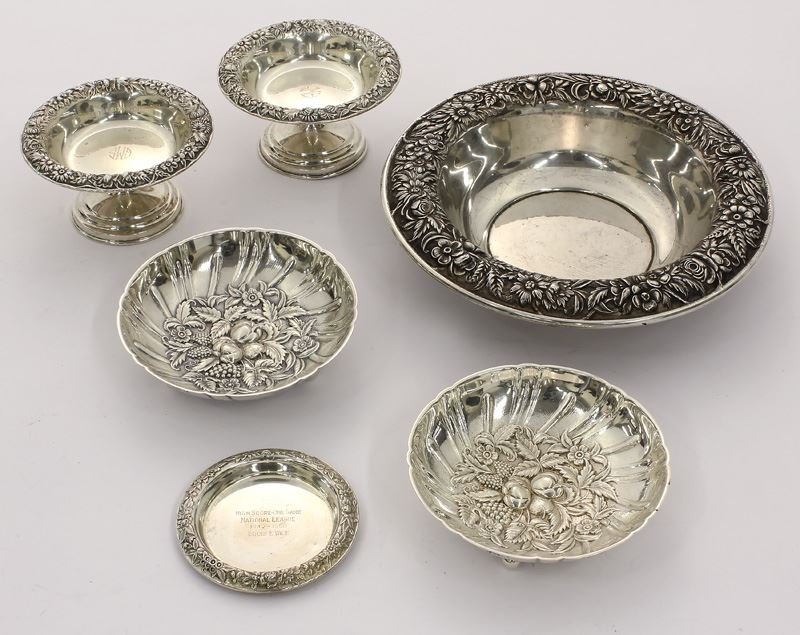 6 Pcs. Kirk Repousse sterling silver: 6 Pcs. Kirk Repousse sterling silver comprising: (1) vegetable serving bowl with everted rim; (2) nut dishes; (2) miniature monogrammed tazze; (1) small trophy platter inscribed to Louis E Wice. 36.04
