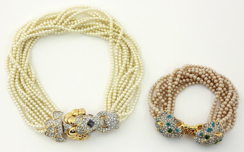 Kenneth J. Lane multi-strand pearl choker: Kenneth J. Lane multi-strand pearl choker and bracelet, choker with ram form gold tone and pave rhinestone and faux sapphire clasp, bracelet with pave rhinestone and enamel leopard heads. Both marked 