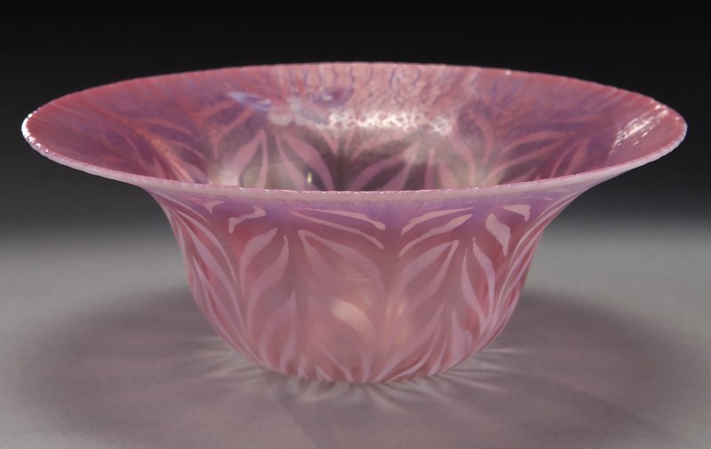 Tiffany pastel pulled feather finger bowl,: Tiffany pastel pulled feather finger bowl, the pink shaded bowl with opalescent pulled feather motif having an intaglio butterfly to rim and stretch border. Underside with rare paper label as well as 