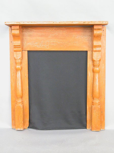American fireplace mantle with a muted p