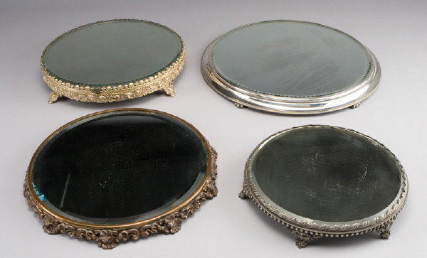 (4) Plateau round footed dresser mirrors