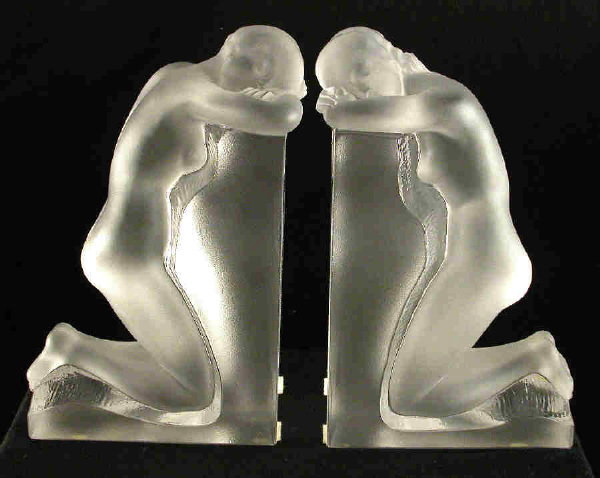 Pair of signed Lalique France bookends of kneeling