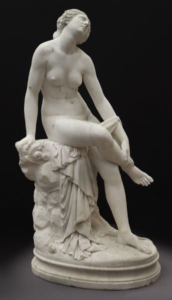Francois Felix Roubaud marble sculpture of: Francois Felix Roubaud marble sculpture of classical female nude seated on a rocky plinth, on an oval base with flowers and a snake. Signed "F. F. Roubaud". Francois Felix Roubaud (French, 1825-1876).