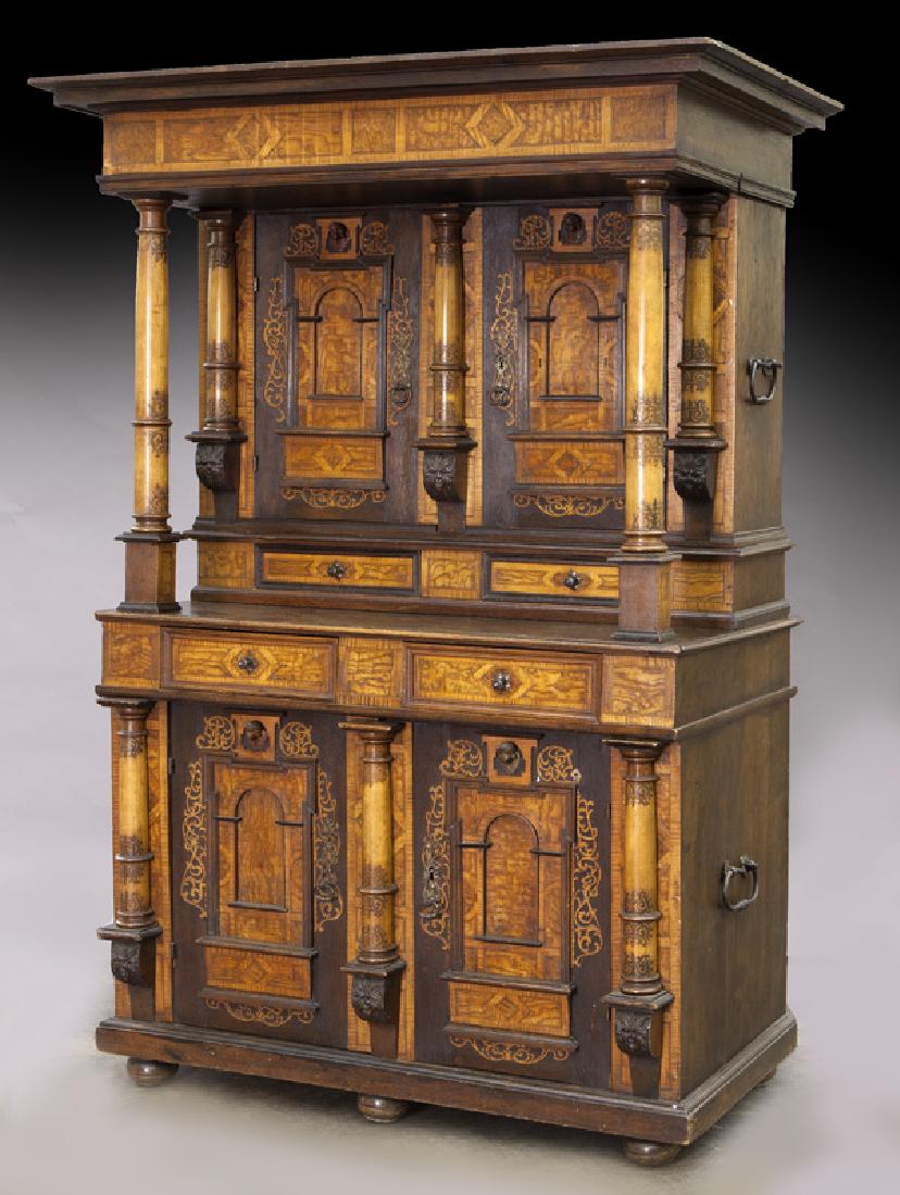 18th C. Alsacienne inlaid cabinet,: 18th C. Alsacienne inlaid cabinet, the stepped inlaid cornice on columnar supports over 2 doors with architectural panels surmounted by putti masks above similar 2 door base, upper and lower sections 