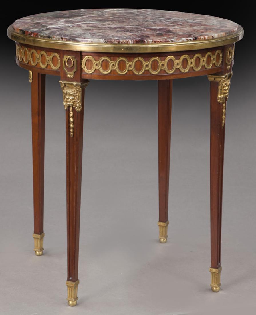 Louis XVI style gueridon signed "Dasson",: Louis XVI style gueridon signed "Dasson", mahogany with dore bronze mounts and marble top. Stamped "Dasson" to underside top. 29"H x 26" Dia., Circa - 1900.