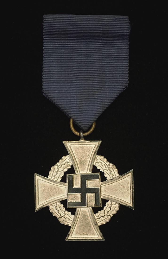WWII German 25 Yr Service Medal: German 3rd Reich 25 Year Faithful Service Medal; Silver & enamel retaining 85% original silver finish and ribbon with pin clasp -excellent.