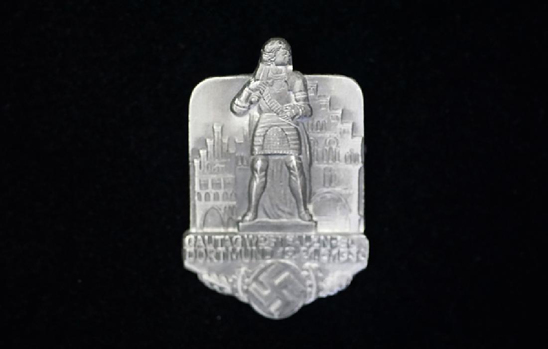German 1936 Gautag Dortmund Badge: Germand 3rd Reich tinnie dated 1938; 30 x 45mm silver aluminum-alloy with pinkback; maker marked reverse-near mint condition.
