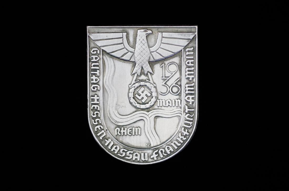 German 1936 Gautag Frankfurt Badge: German 3rd Reich tinnie dated 1936; 35 x 45mm silver- aluminum alloy with pin-back; maker marked reverse; uncommon -mint condition.