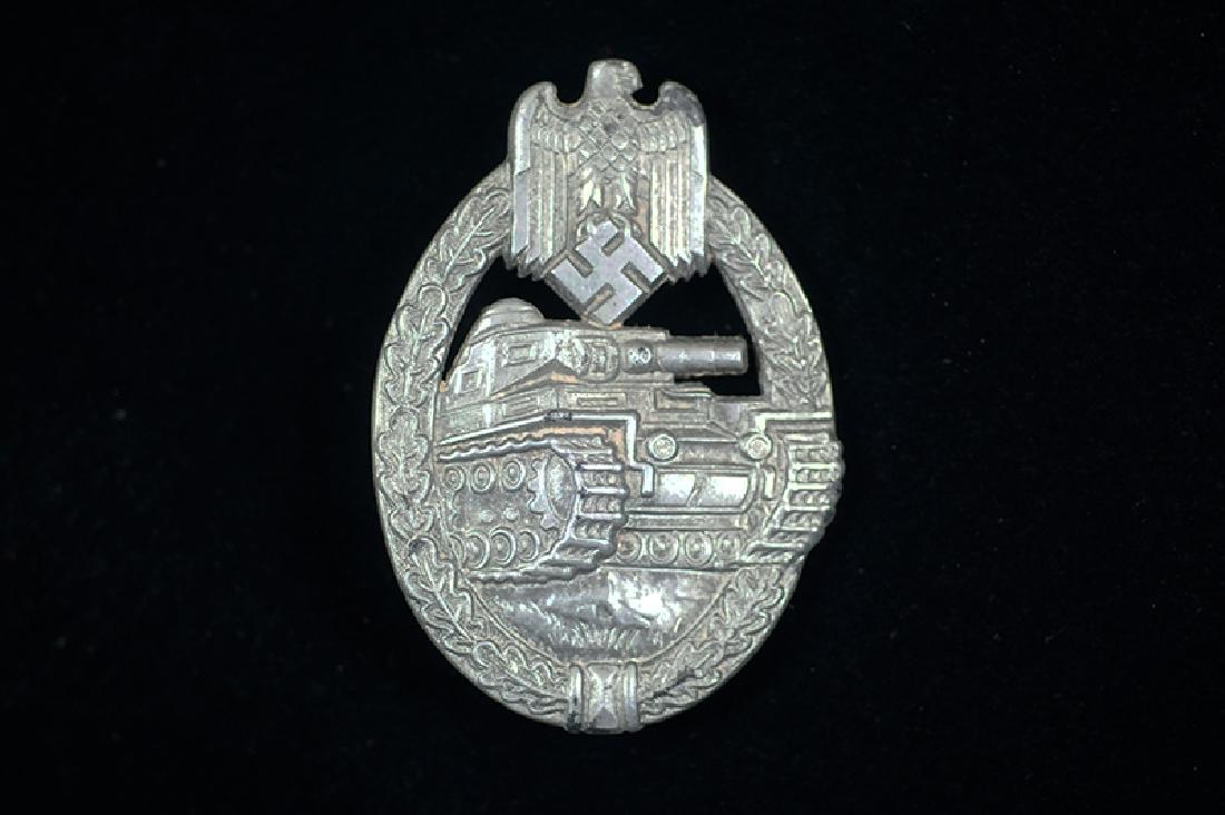 WWII German Panzer Assault Badge by Rudolf Richter: German 1940 Panzer Assault Badge; die struck zinc, maker marked R.R.S for Rudolf Richter; excellent condition.