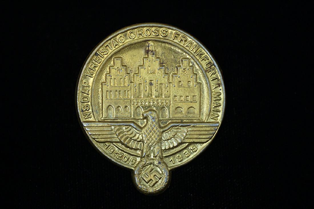 German 1938 Kreistag-Gross Frankfurt Badge: German 3rd Reich tinnie dated 1938; 40mm gold steel-alloy with pin-back -mint condition.