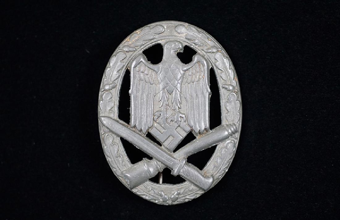 WWII German General Assault Badge 1940: WWII German General Assault Badge 1940; die struck zinc, ball hinge pin assy; unmarked -excellent condition.