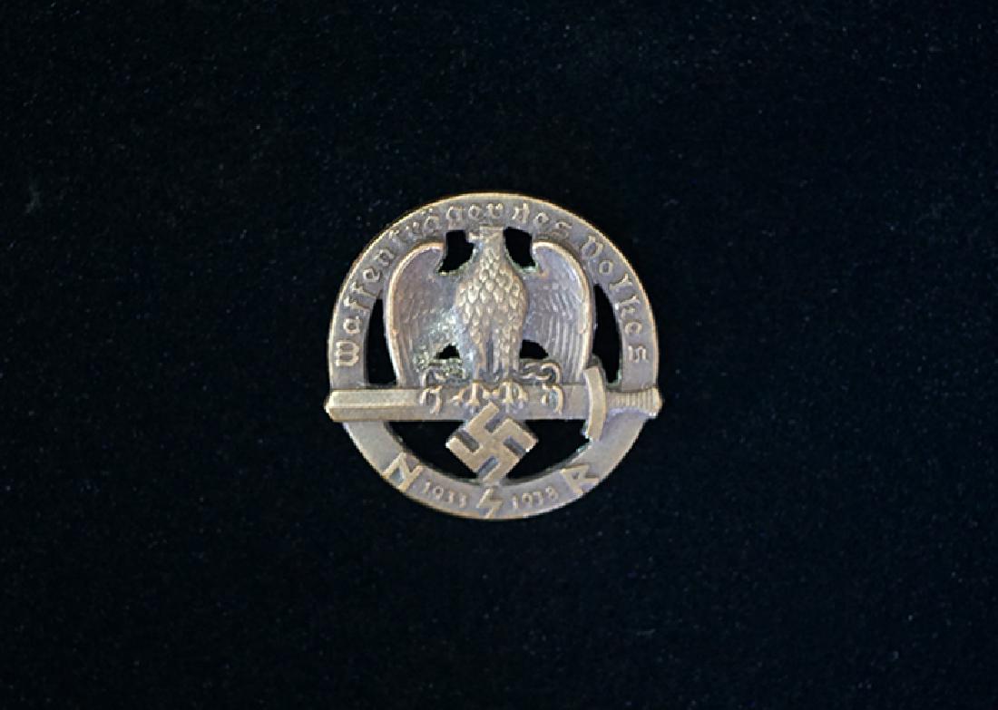 German 1933-38 NSR Bronze Badge: German 3rd Reich badge dated 1933-38; 25mm die stamped solid bronze badge that was on a stickpin; uncommon and with the exception of the missing pin still mint condition.