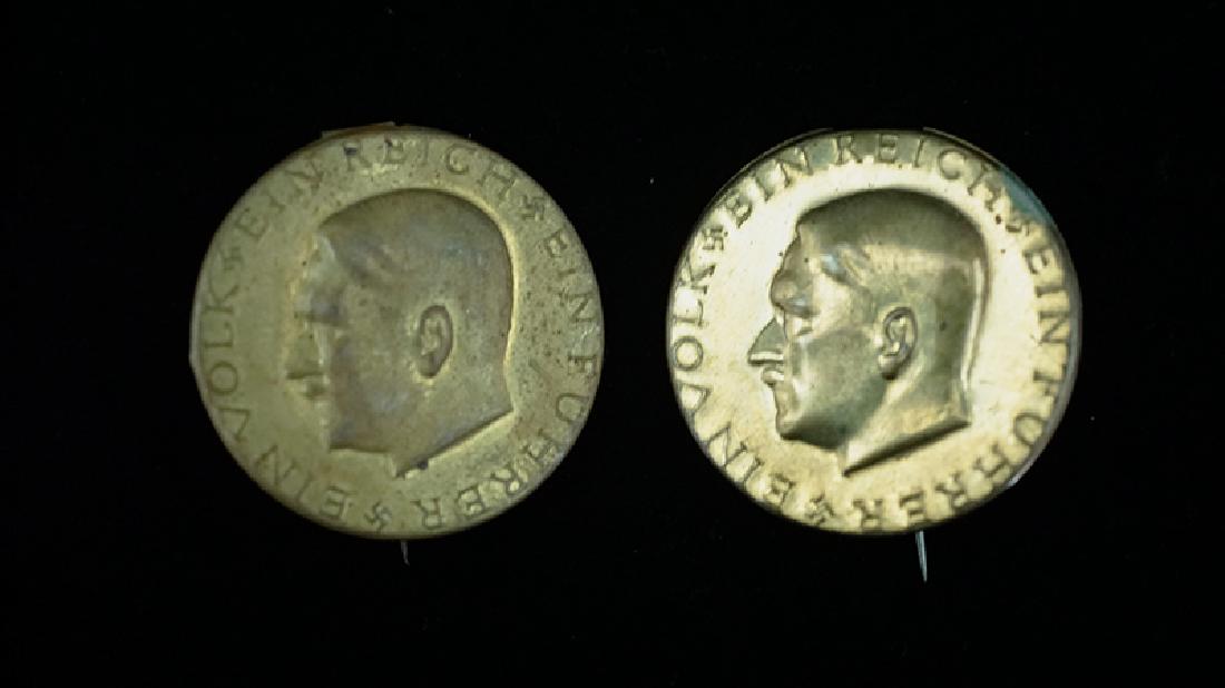 WWII German Fuhrer Badge 2-each: German 3rd Reich Election tinnie; 30mm stamped steel alloy having "Ein Volk, Ein Reich, Ein Fuhrer; pin back; 2 each -one very good & one mint.