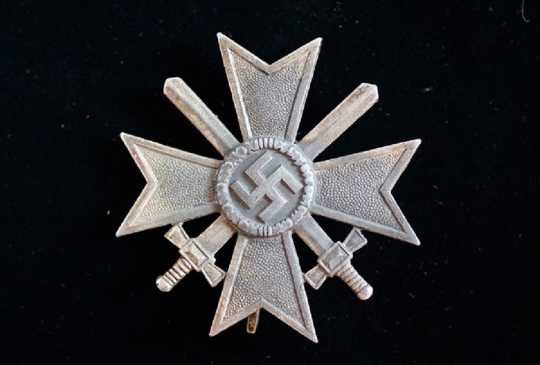 WWII German War Merit Cross 1st Class: German WW2 War Merit Cross 1st Class with Swords; maker marked #3 for 'Wilhelm Deumer, Ludenscheid'; very good.