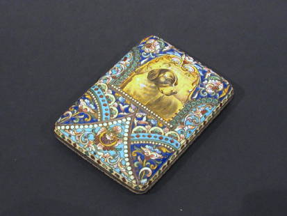 Russian Enamel Silver Cigarette Case: All over enamel designs with blue stone cap and lacquered picture of a St. Bernard. Hallmarked. 3.25" X 4".7 oz troy. (From a Central Park West Estate)