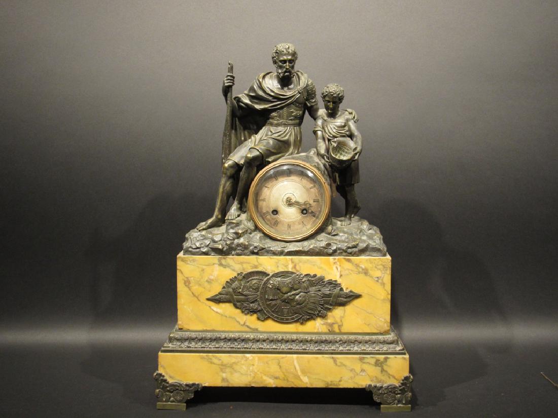 French Bronze Surmounted Mantle Clock: Surmount of a bearded man and Young man with helmet in hand. Marble base with Empirical bronze mounts all around. 19th Century. 12" X 5" X 18".