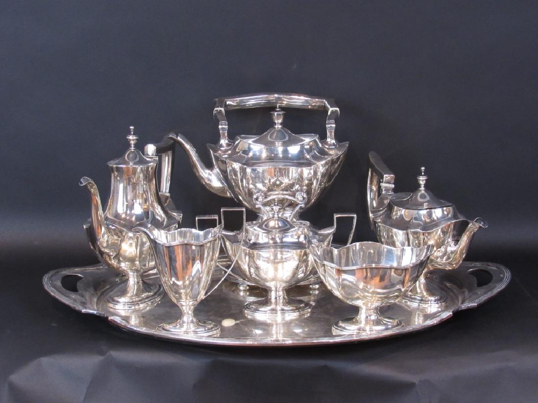 6 Piece Sterling Assembled Tea & Coffee Service: Sterling Silver: Gorham Kettle on stand, Brand-Hier teapot, coffee pot, sugar and creamer. Gorham finger bowl. 110 oz. troy, NOT including tray. The tray is a silver plated tray by Gorham.