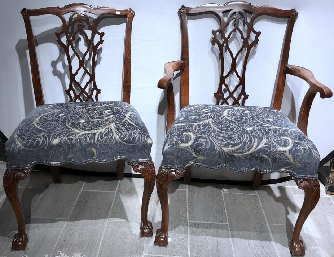 Set of 8 Chippendale Style Dining Chairs: Set of 8 Chinese Chippendale nicely carved ball and claw feet and cabriole dining chairs. Fine condition. One missing 3" piece of veneered photographed.38" H 25" W 18" D - 19.5" seat Height Side chair