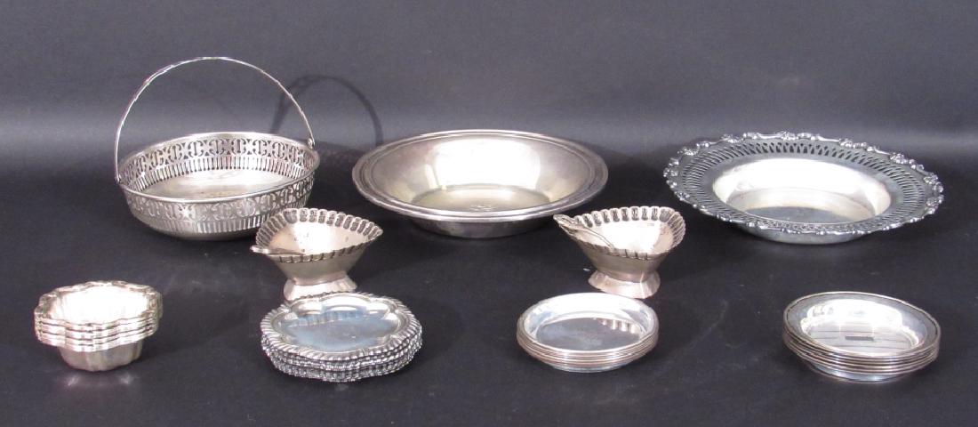 Assorted Sterling Silver Small Articles: 3 dishes, 2 salts with .800 silver spoons, and 4 sets of nut dishes (counts are left to right 6 - 8 - 6 - 6). 28 oz troy.