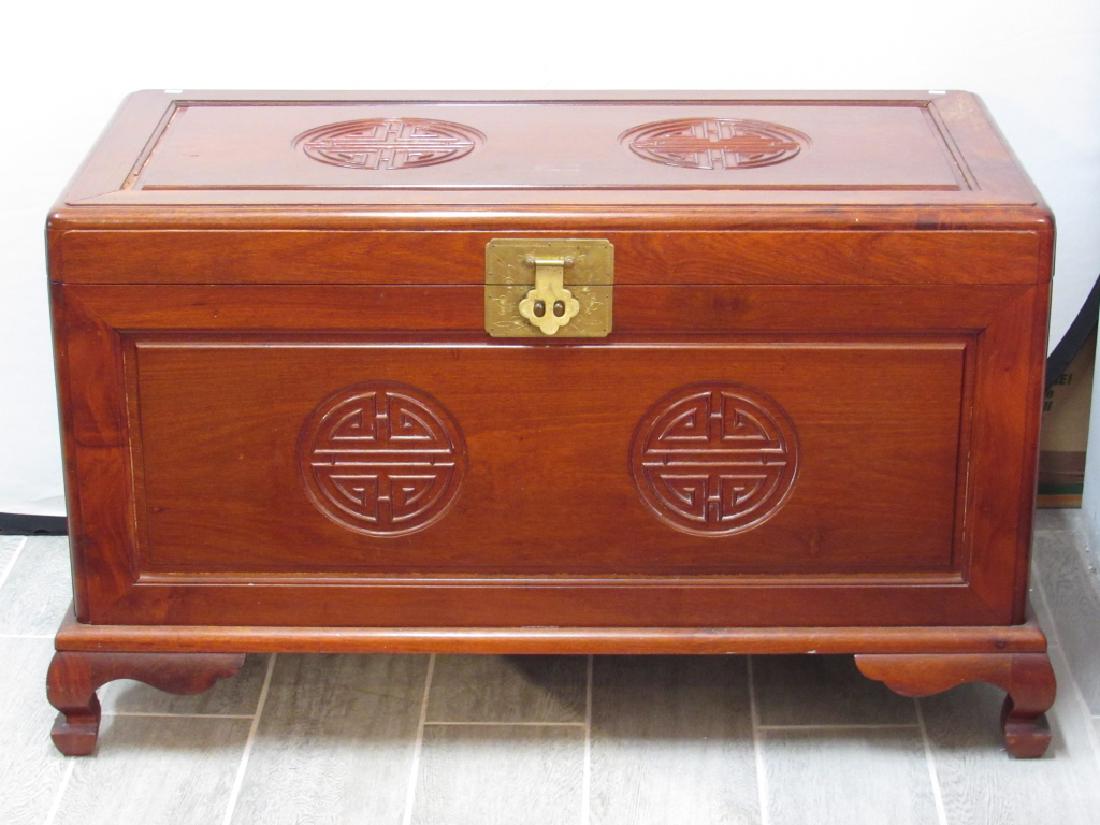 A Custom Chinese Vintage Dowry/ Blanket Chest: A custom Chinese vintage dowry/ blanket chest with brass hardware and shelf drawer compartment on the interior. cedar line. Round incised panels. 42" W 22"D 24"H.