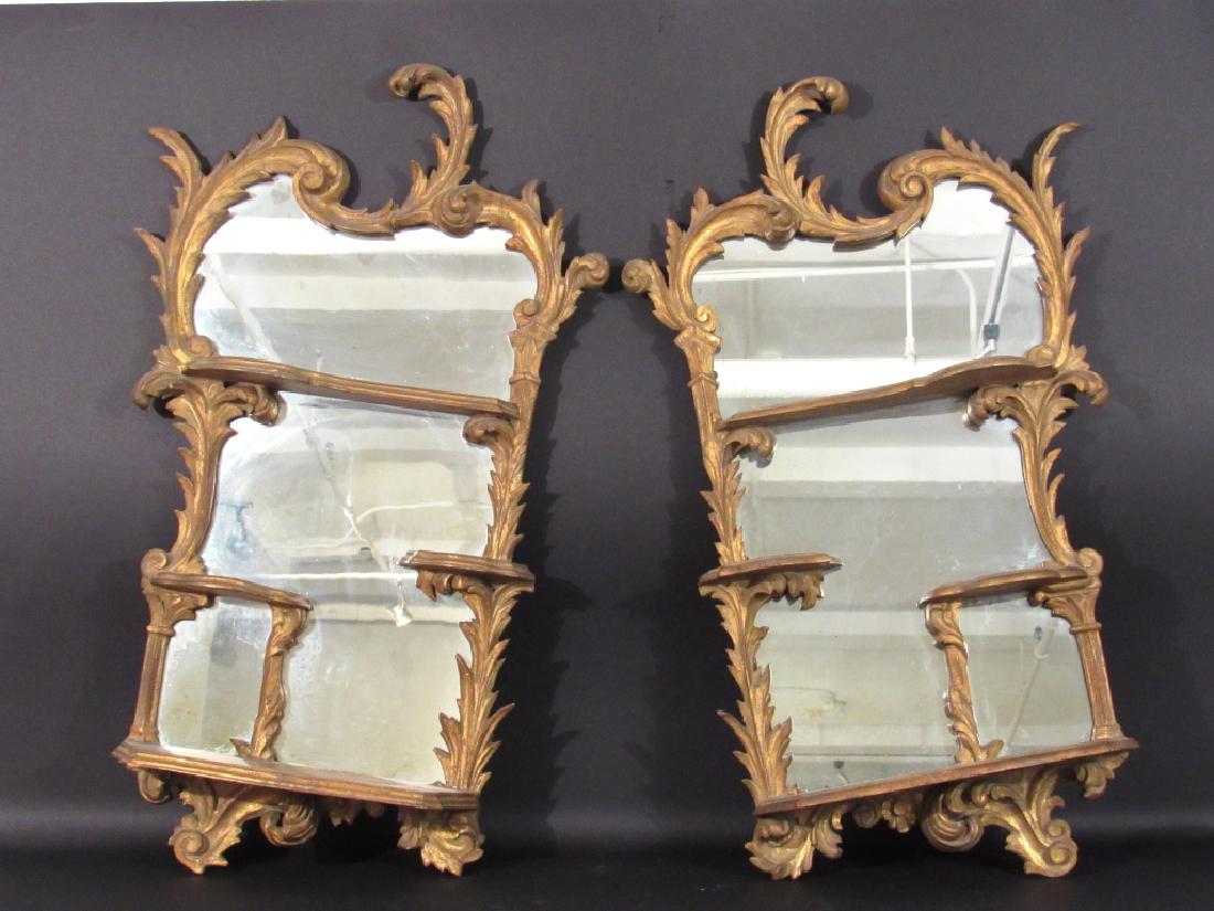Pair Rococo Gilt Mirrored Brackets: Each with 3 small and one base shelf. Gilt gesso scrolling frames. 17"w X 29"h X 5"d.