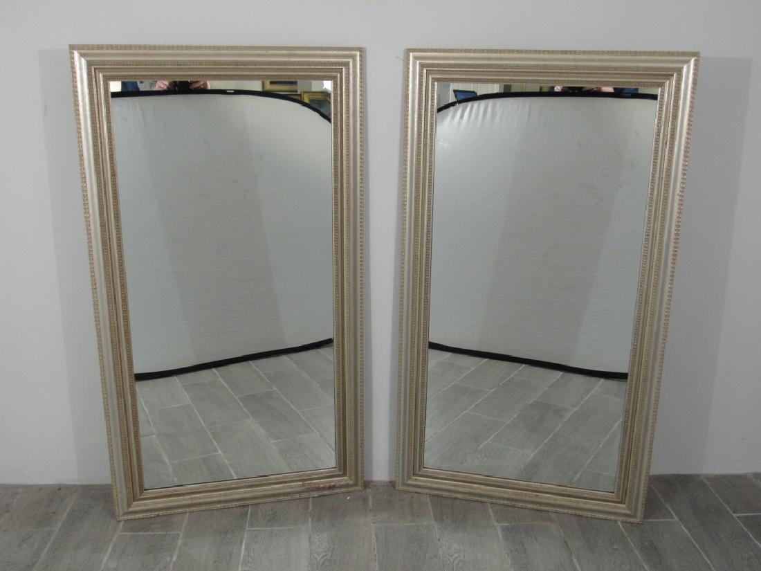 Pair Silver Gilt Framed Mirrors: Running waving and ogee silver gilt frames. 29.5" X 53".