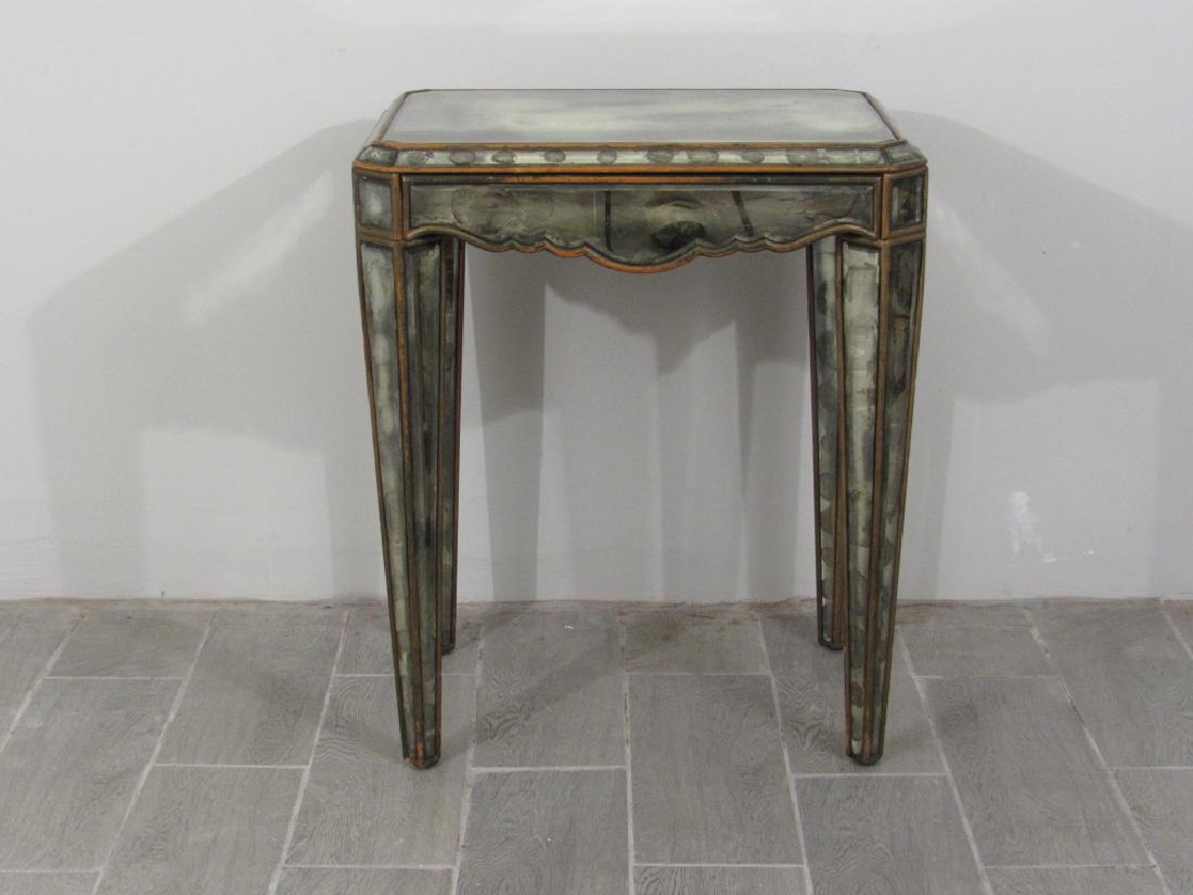 Venetian / Hollywood Regency Lamp Table: All over thick glass smoky mirror mounts inset in a gilt painted wood frame with one drawer. Sculpted apron with square tapered legs. All mirrors in very good condition.24"w X 18"d X 28"h