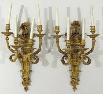 Pair Caldwell Dore Bronze Sconces: 4 scrolling arms on backplates having feathered helmet pediments over crossed quivers atop stop fluted tapering columns and grape cluster drops. ***** E. F. Caldwell marks on both backs. 14.5"W X