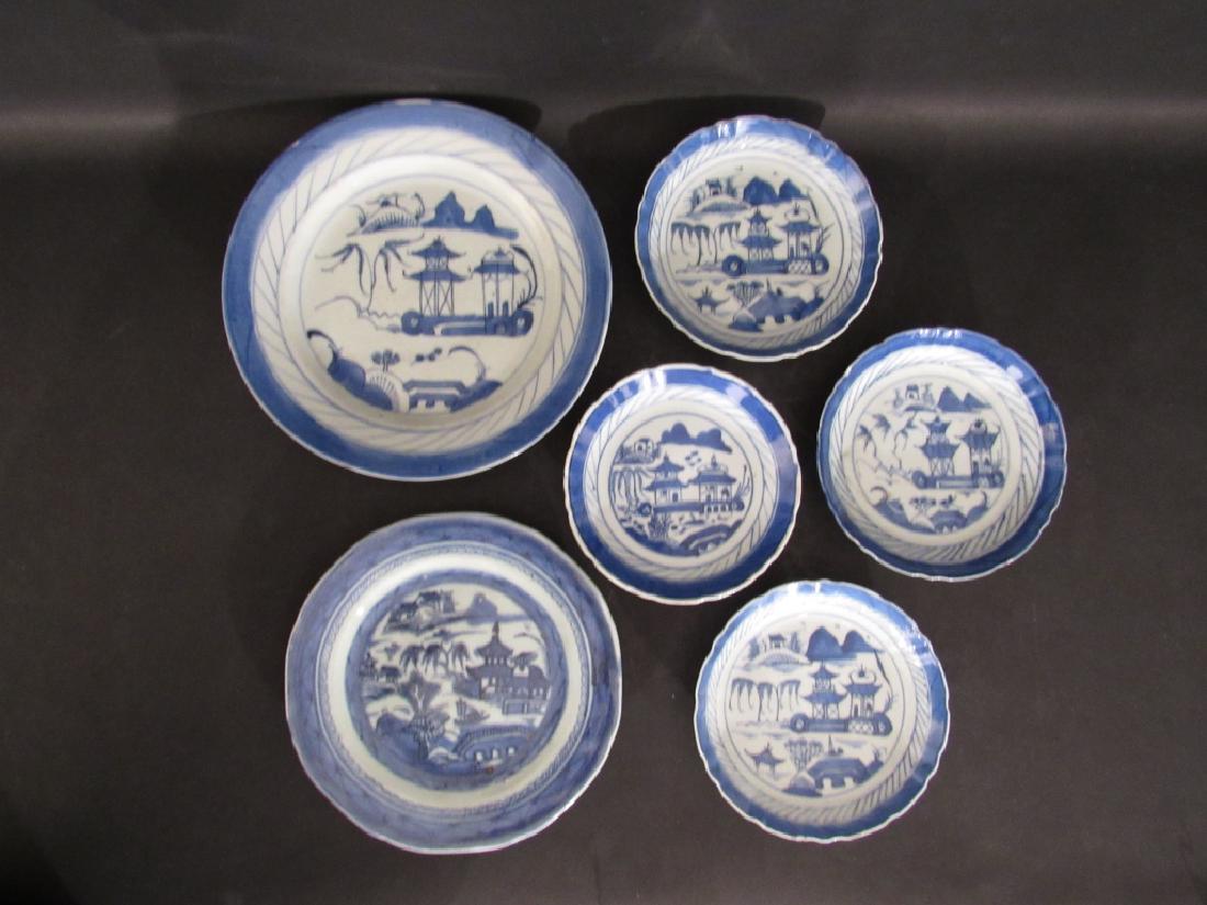 Assorted Antique Canton Export Plates and Saucers: 2 blue and white Canton plates and 4 saucers with some minor chips. 1 saucer marked on the bottom.