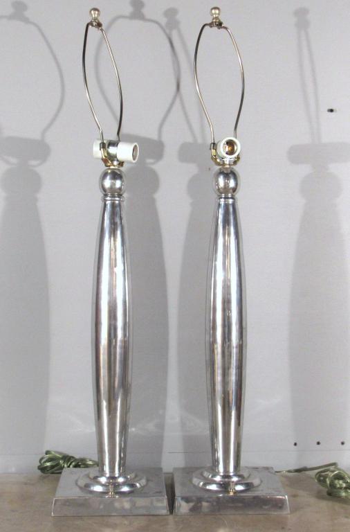 Pair Modernist Polished Alloy Column Lamps: Polished finish in tapered columnar posts with ball tops and square bases. 9"square bases X 37"H with harps.