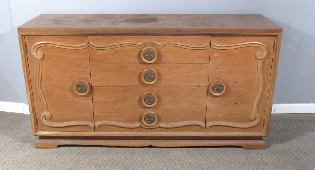 Mid Century Carved Oak Credenza: 4 center drawers flanked by 2 side doors with interior drawers. Bronze drawer knob mounts, veneer loss to the top, wear and scratches to the exterior, 62"w X 20"d X 32.5'h