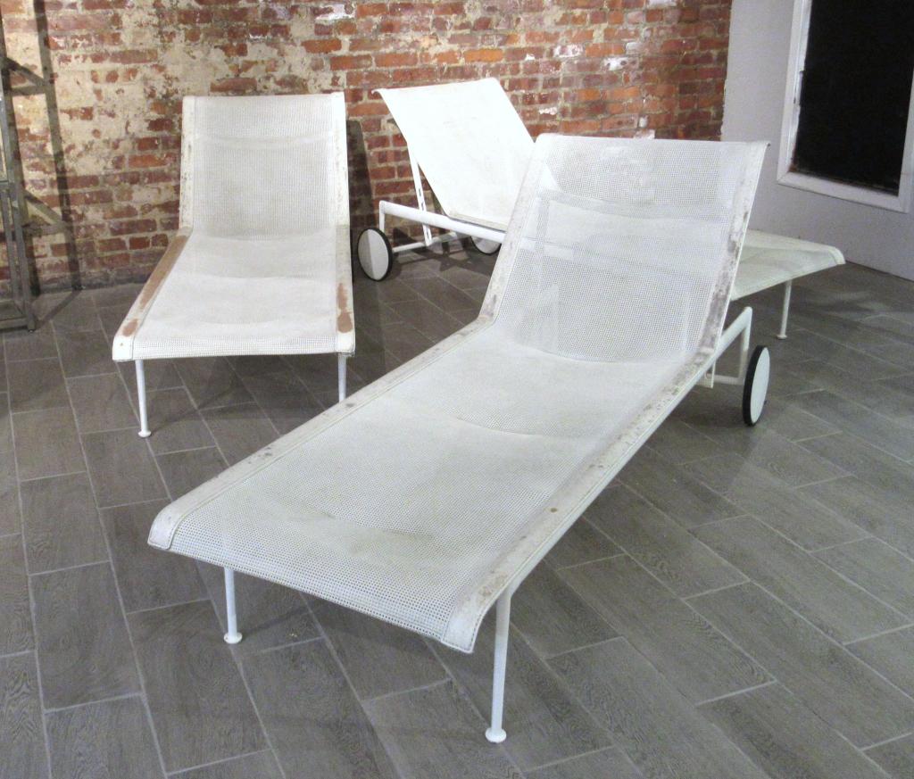 Three Richard Schultz Rolling Chaise Lounges: Adjustable with wear to pleather straps, structurally sound. Dirty. One wheel missing rubber, one with damaged rubber. 25"W X 76"D X 14"H (when flat). From an East Hampton Home.