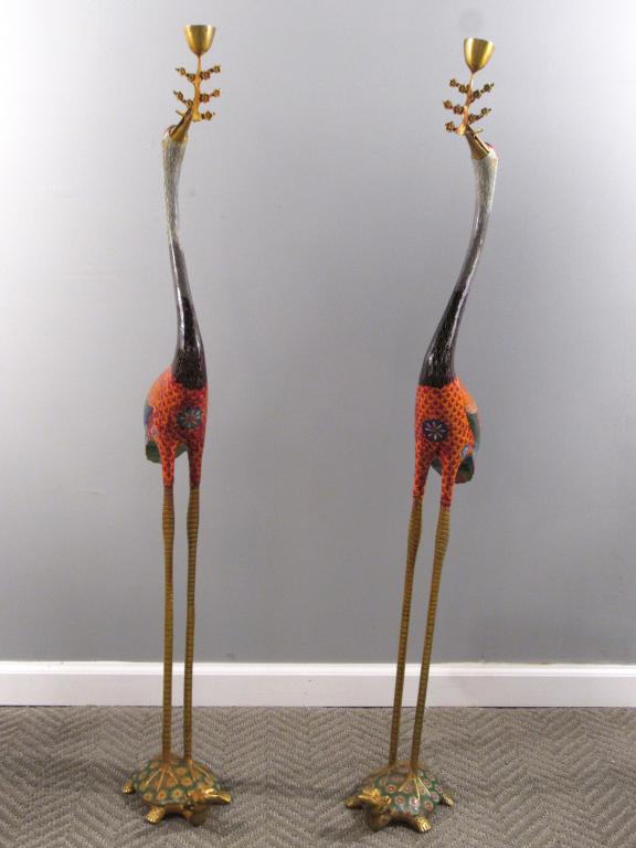 Pair Tall Chinese Cloisonné Cranes: Cranes as candle holders with multi color designs, stand atop turtles of patterned shells. 8" X 6" X 47". (New York City Collection)