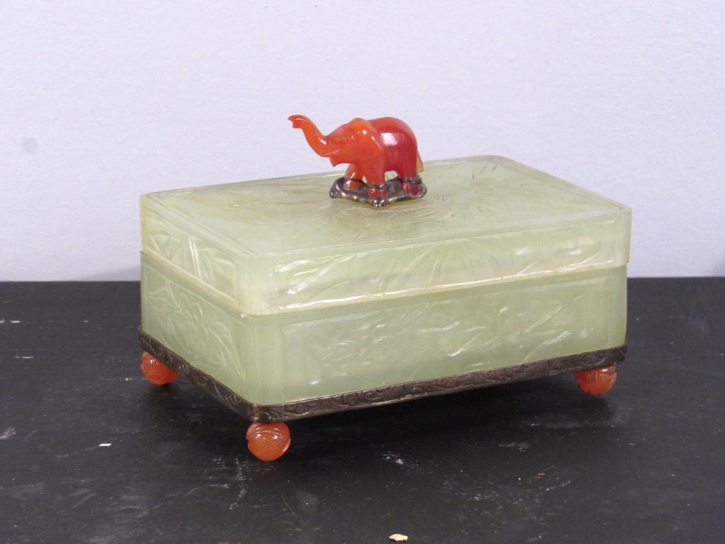 Chinese Jade and Carnelian Box: Small carnelian elephant mounted on jade box. Carved box on 4 round carnelian feet. 5" X 3.5" X 3.5"H. (Staten Island Private Collection)