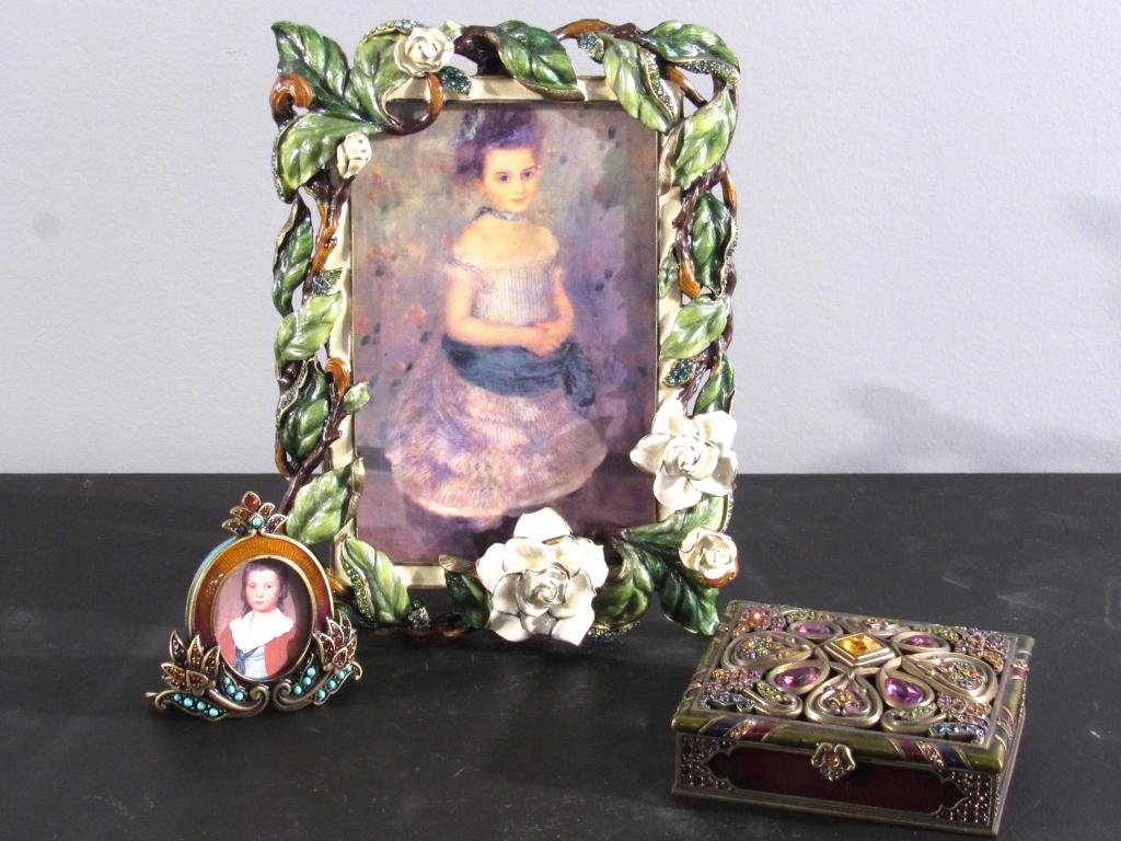 3 Jay Strongwater Articles: 2 frames with easels, 1 box. Enameled and jeweled. Largest frame holds 4" X 6" picture, is 5.75" X 7.75". (Staten Island Private Collection)