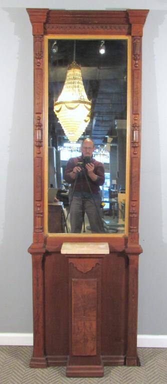 Eastlake Pier Mirror: Carved, incised walnut, with gilt border mirror. Table height marble top. We have the missing molding. 28"W X 10"D X 87"H