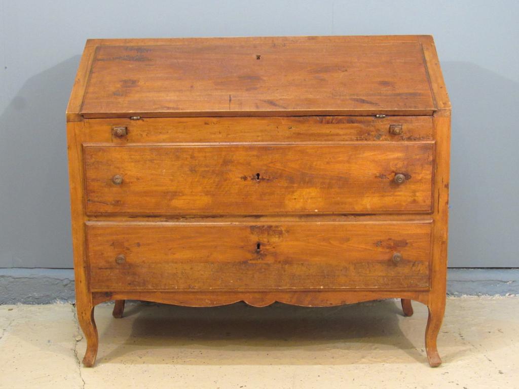Antique Country French Slant Front Desk: Old fruitwood with a plank top with old hardware and locks, interior drawers, 2 front drawers on small sloping legs. 44" X 22" X 40"h